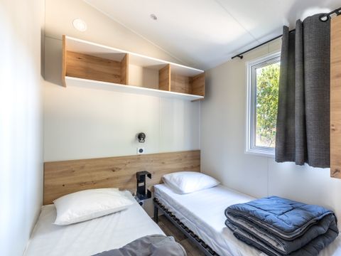 MOBILHOME 4 personnes - BAHIA BOIS 29m²  - 2 chambres avec une terrasse bois couverte et une terrasse solarium