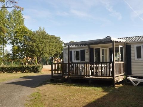 Mobilhome 1/4 personnes - Classique - 2 chambres - Avec terrasse