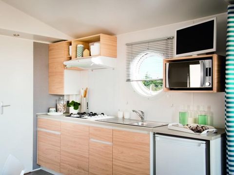 MOBILHOME 4 personnes - GOYAVE -25 m² - 2 chambres- terrasse intégrée