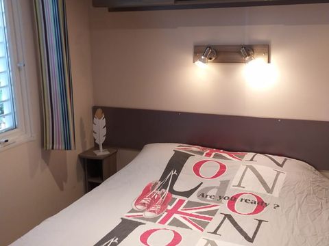 Mobilhome 4 personnes - Loggia Confort 24m² - 2 chambres - Terrasse couverte - Clim - TV