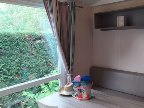 Mobilhome 4 personnes - Loggia Confort 24m² - 2 chambres - Terrasse couverte - Clim - TV