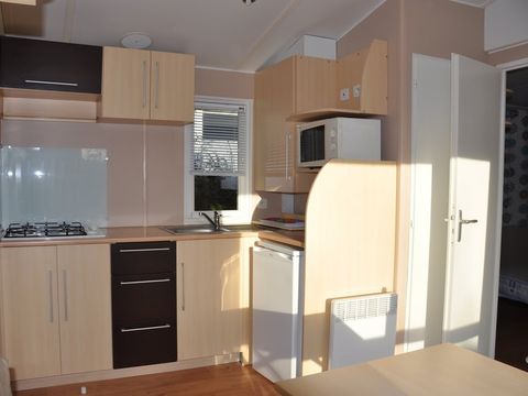 Mobilhome 4/5 personnes - Loggia 26 m² - 2 chambres - TV