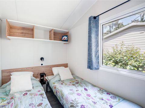 Mobilhome 4 personnes - Premium 31m² - 2 chambres - Lave Vaisselle - Terrasse semi-couverte 15m²