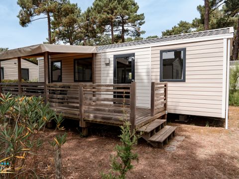 Mobilhome 4 personnes - Premium 32m² - 2 chambres - 2 salles de bain - Lave Vaisselle - Terrasse semi-couverte 15m²