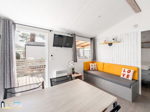 Mobilhome 4 personnes - Premium 32m² - 2 chambres - 2 salles de bain - Lave Vaisselle - Terrasse semi-couverte 15m²