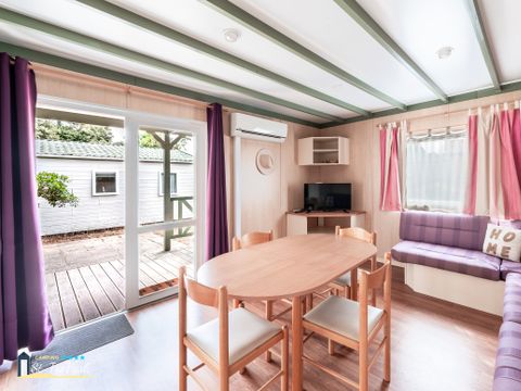 CHALET 4 personnes - Chalet Premium 35m² (2 chambres) + Climatisation + Lave-vaisselle + Terrasse couverte 12m²