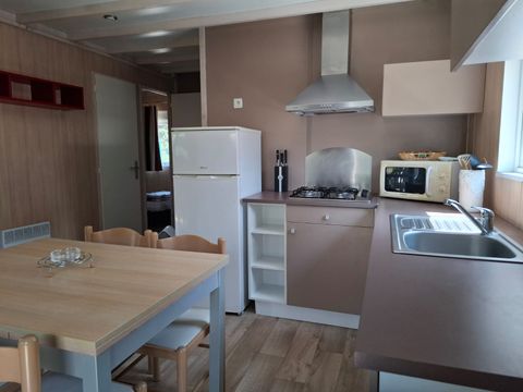Chalet 6 personnes - Premium 34m² - 3 chambres - Climatisation - Lave-vaisselle - Terrasse couverte