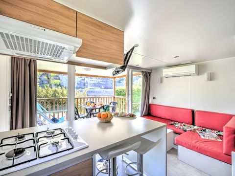 Mobilhome 4 personnes - Mobil home Premium 27 m² 2 chambres + terrasse couverte 9m² + TV + Clim + Vue Rivière 4 pers