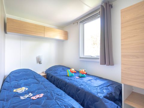 Mobilhome 4 personnes - Mobil home Premium 27 m² 2 chambres + terrasse couverte 9m² + TV + Clim + Vue Rivière 4 pers