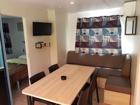 MOBILHOME 7 personnes - Mobil home Luxe 32m² 3 chambres + terrasse 12m² semi-couverte (9m²) + TV + Clim 6/7 pers