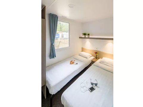 BUNGALOW 5 personnes - Mobil-home | Comfort | 2 Ch. | 5 Pers. | Terrasse Lounge | 1 SDB | Clim.