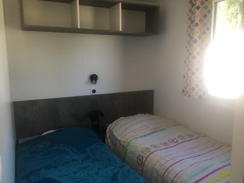 MOBILHOME 4 personnes - 2 chambres compact 24 m2 avec  terrasse couverte 10 m2