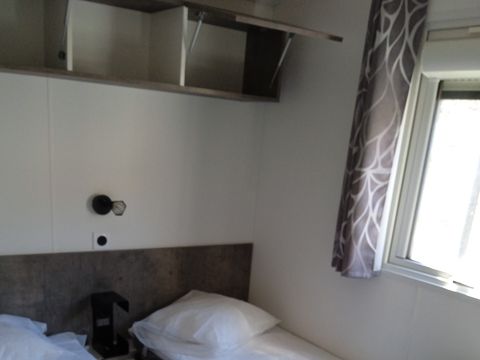 MOBILHOME 4 personnes - Confort 27m² - 2 chambres + Terrasse couverte + Clim réversible + TV
