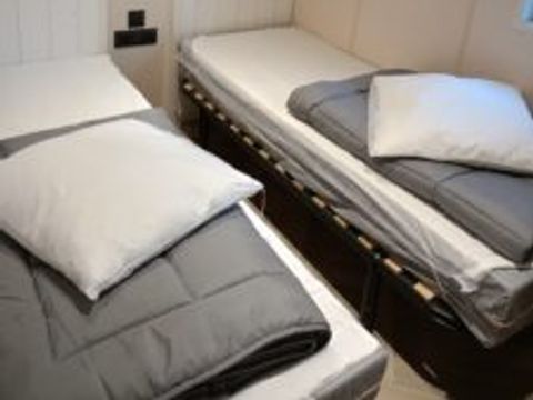 CHALET 4 personnes - PMR Confort - 2 chambres + Terrasse couverte + Clim réversible + TV