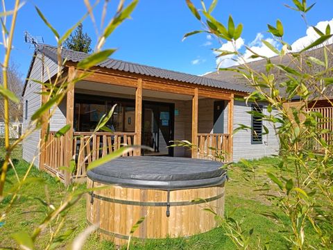 CHALET 4 personnes - SPA Confort 35m² - 2 chambres + Terrasse couverte + Clim réversible + TV