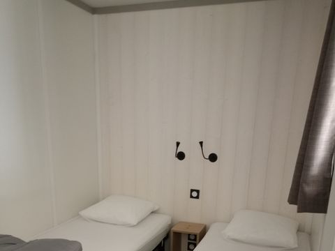 CHALET 6 personnes - Premium 56m² - 3 chambres + Terrasse couverte + Clim réversible + TV