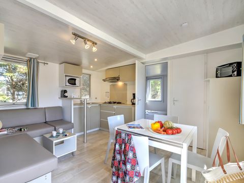 Mobilhome 4 personnes - Bois Confort 30m² - 2 chambres - Terrasse semi-couverte - TV - CLIM