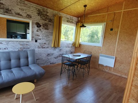 Hébergement 4 personnes - Cottage sur pilotis Privilège 35m² -1 chambre + 1 alcôve - lave vaisselle - terrasse face aux étangs