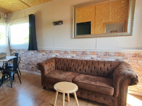 Hébergement 4 personnes - Cottage sur pilotis Privilège 35m² -1 chambre + 1 alcôve - lave vaisselle - terrasse face aux étangs
