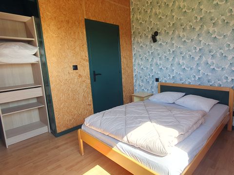 Hébergement 4 personnes - Cottage sur pilotis Privilège 35m² -1 chambre + 1 alcôve - lave vaisselle - terrasse face aux étangs
