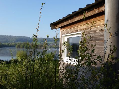 Hébergement 4 personnes - Cottage sur pilotis Privilège 35m² -1 chambre + 1 alcôve - lave vaisselle - terrasse face aux étangs