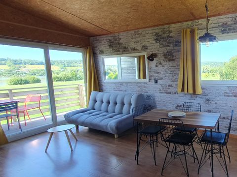Hébergement 4 personnes - Cottage sur pilotis Privilège 35m² -1 chambre + 1 alcôve - lave vaisselle - terrasse face aux étangs