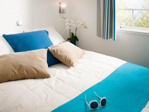 Mobilhome 4 personnes - Bois - CONFORT 29m² - 2 chambres - Terrasse - TV - Quartier piéton - Nespresso