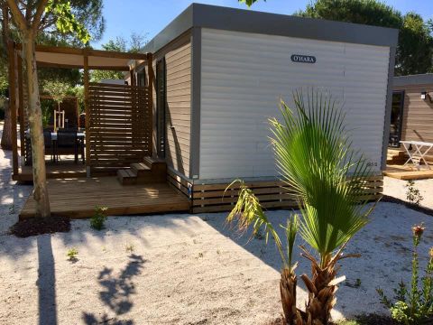 MOBILHOME 4 personnes - Mobil-home ORANGER Premium 33m2 (2 chambres) terrasse couverte 19m2- 2 SDB + LV + TV + Climatisation 1/5 pers