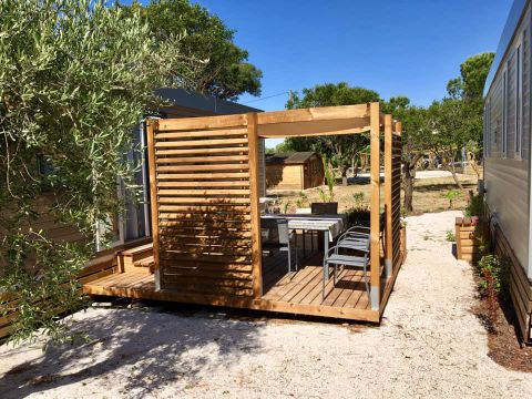 MOBILHOME 6 personnes - Mobil-home LAURIER ROSE Premium (3 chambres) 33m2 - terrasse couverte 19m2+ LV + TV + Climatisation 1/7 pers