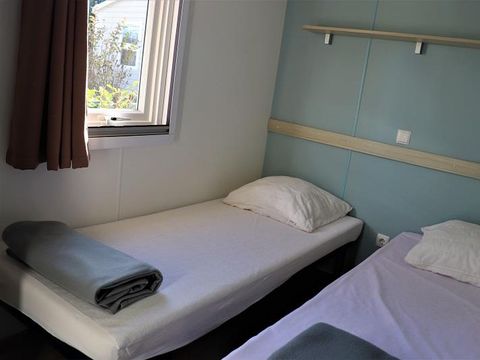 MOBILHOME 4 personnes - Mobile Home Confort 29 m2 (2 chambres) + clim + terrasse couverte + TV 4 pers