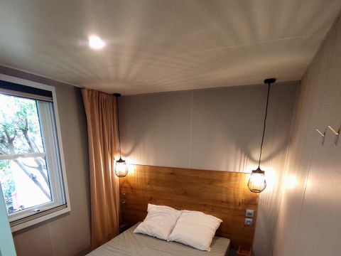 MOBILHOME 4 personnes - Premium 30m² (2ch) dont 8m² terrasse intégrée + terrasse couverte + Clim + TV + LV