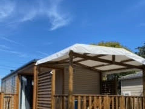 MOBILHOME 4 personnes - Premium 30m² (2ch) dont 8m² terrasse intégrée + terrasse couverte + Clim + TV + LV