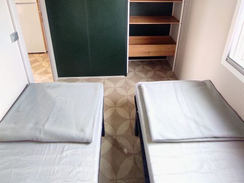 MOBILHOME 4 personnes - Premium 30m² (2ch) dont 8m² terrasse intégrée + terrasse couverte + Clim + TV + LV
