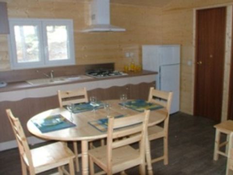 CHALET 7 personnes - Chalet Confort 35m² 2 chambres - sans clim 1/7 pers