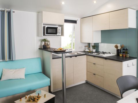 MOBILHOME 7 personnes - Mobil-home confort 34 m2 (3ch-6/7 pers) + terrasse 6/7 pers