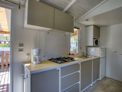 Mobilhome 4 personnes - Confort 30m² - 2 chambres - Terrasse couverte 13m² - TV