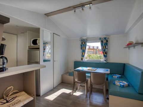 Mobilhome 4 personnes - Confort 26m² - 2 chambres - Terrasse couverte - TV