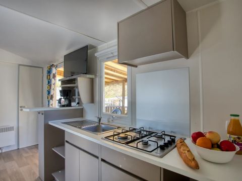 Mobilhome 4 personnes - Confort 26m² - 2 chambres - Terrasse couverte - TV