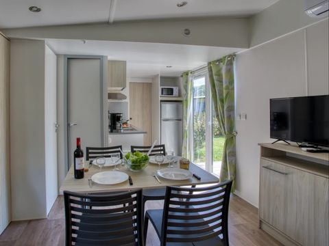 Mobilhome 4 personnes - Premium 34m² - 2 chambres - Climatisation - Lave-vaiselle - TV