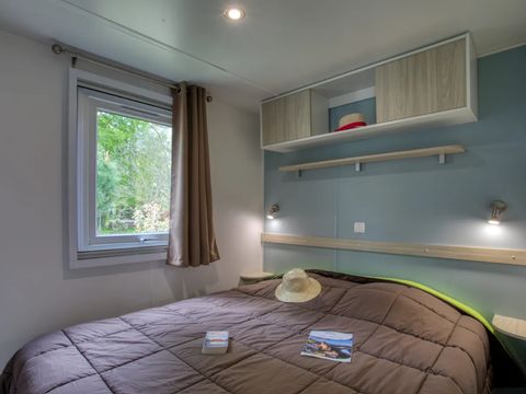 Mobilhome 4 personnes - Premium 34m² - 2 chambres - Climatisation - Lave-vaiselle - TV