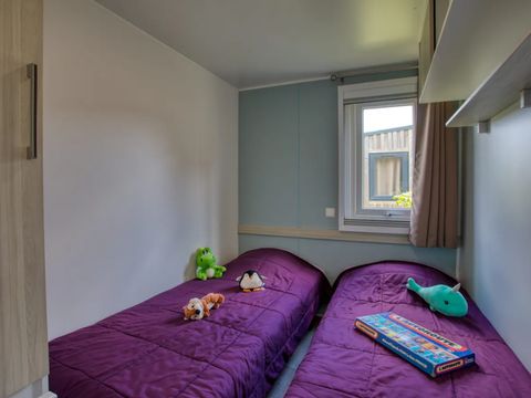 Mobilhome 4 personnes - Premium 34m² - 2 chambres - Climatisation - Lave-vaiselle - TV