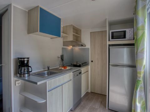 Mobilhome 4 personnes - Premium 34m² - 2 chambres - Climatisation - Lave-vaiselle - TV