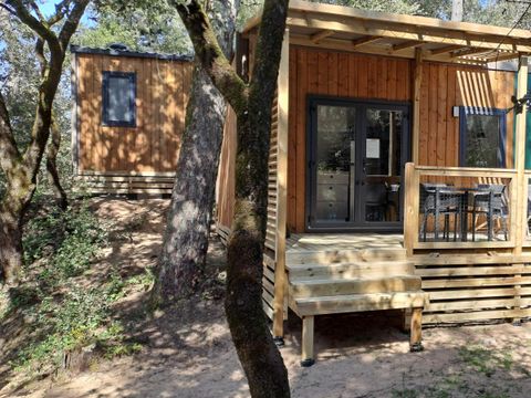 Mobilhome 2 personnes - Homeflower Premium 18m² - 1 chambre - Terrasse semi-couverte - Lave-vaisselle - TV - Draps - Clim