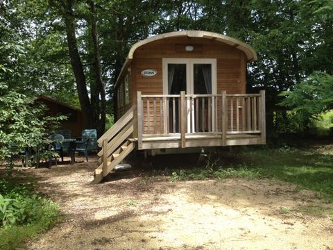 Hébergement 4 personnes - Roulotte Standard 20m² - 2 chambres - Salon de jardin