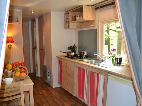 Hébergement 4 personnes - Roulotte Standard 20m² (2 chambres) - salon de jardin 4 pers.