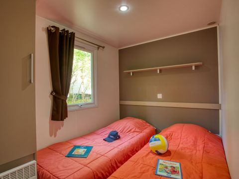 Mobilhome 6 personnes - Confort 34m² - 3 chambres - Terrasse couverte - TV