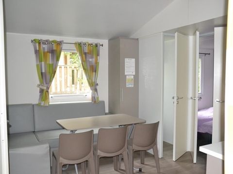 Mobilhome 6 personnes - Confort 34m² - 3 chambres - Terrasse couverte - TV
