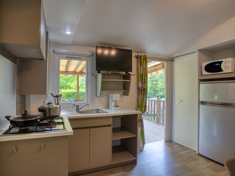 Mobilhome 6 personnes - Confort 34m² - 3 chambres - Terrasse couverte - TV
