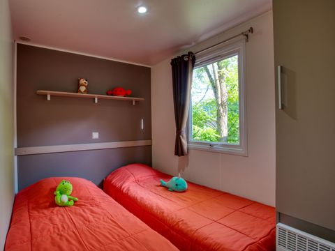 Mobilhome 6 personnes - Confort 34m² - 3 chambres - Terrasse couverte - TV
