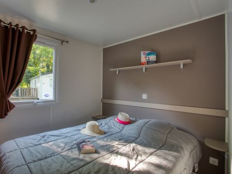 Mobilhome 6 personnes - Confort 34m² - 3 chambres - Terrasse couverte - TV